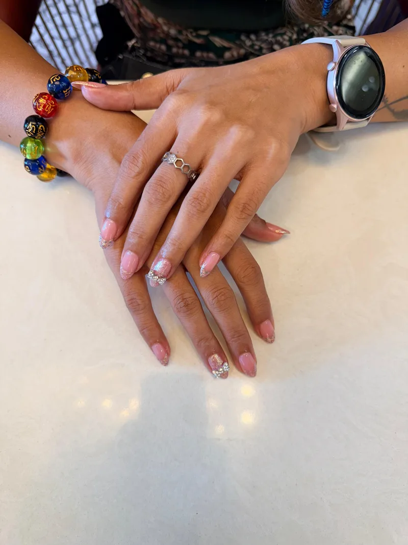 Glitter Bow nails by Haus of Nails by Ritu, Gurgaon